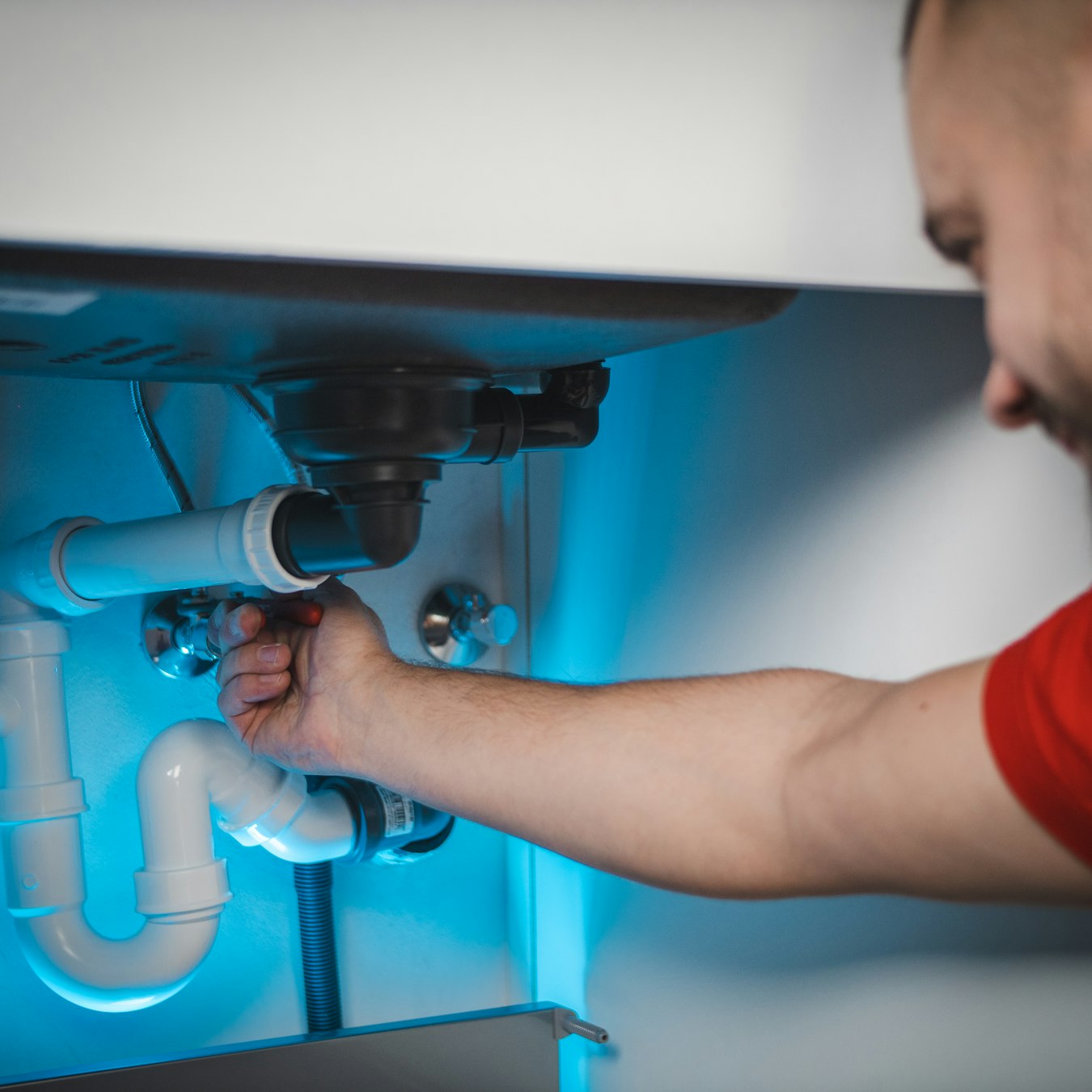 Newmarket Plumbing Pros licensed plumber on a service call in Newmarket, Ontario